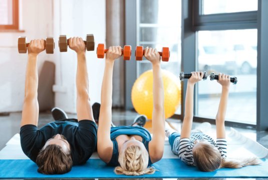 Family_exercising_with_dumbbells