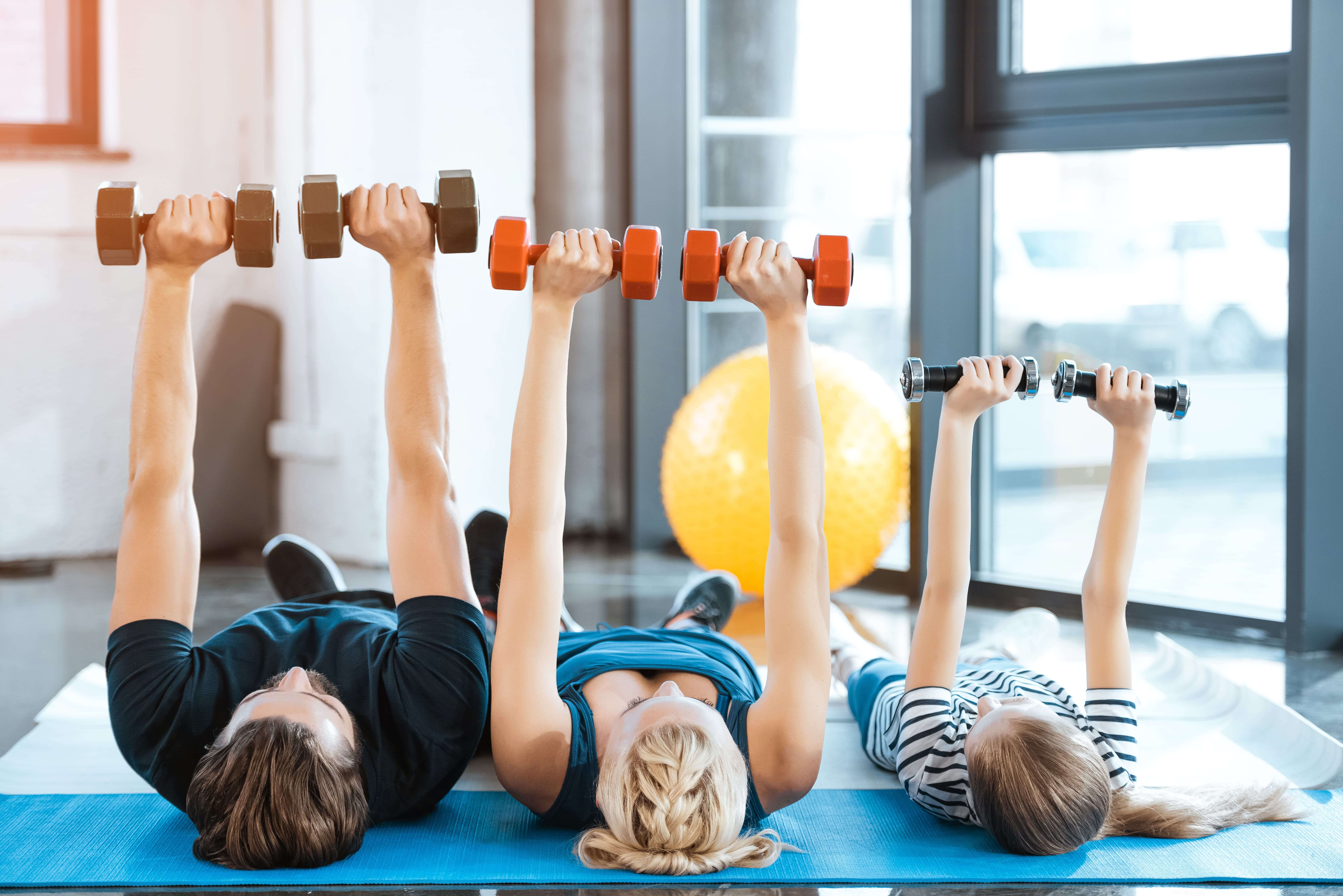 Family_exercising_with_dumbbells